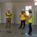 USACE personnel and contractors provide updates and tour of temporary school to Rep. Jill Tokuda