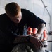 Sailor Shines Brass Aboard USS Carl Vinson (CVN 70)