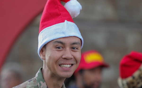 Service members take children shopping for "Heroes and Helpers" holiday event