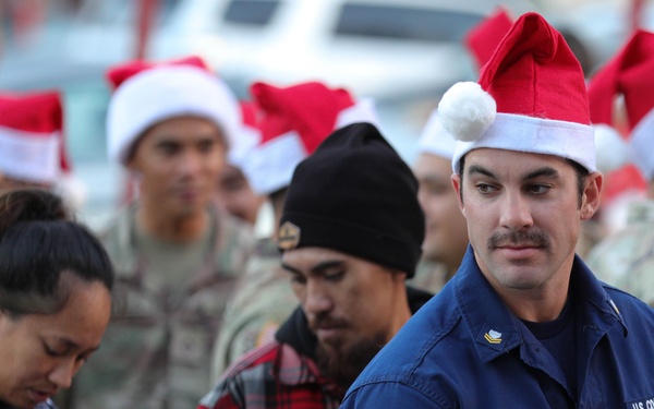 Service members take children shopping for "Heroes and Helpers" holiday event