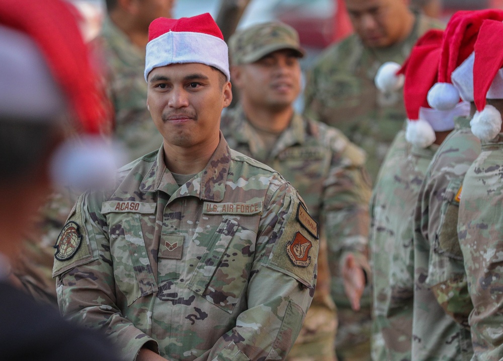 Service members take children shopping for &quot;Heroes and Helpers&quot; holiday event