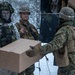 Freezing Winds 23: Marines With CLB-6 Resupply Finnish Service Members of The Nylands Brigade