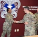 COL Welde congratulates SSG Kemp