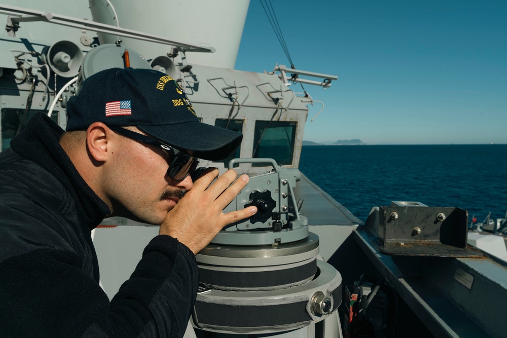 Delbert D. Black Transits the Strait of Gibraltar.