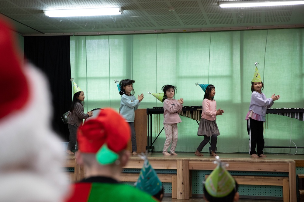 Holiday cheer: Volunteers from Marine Corps Air Station Iwakuni visit Higashi Nursery