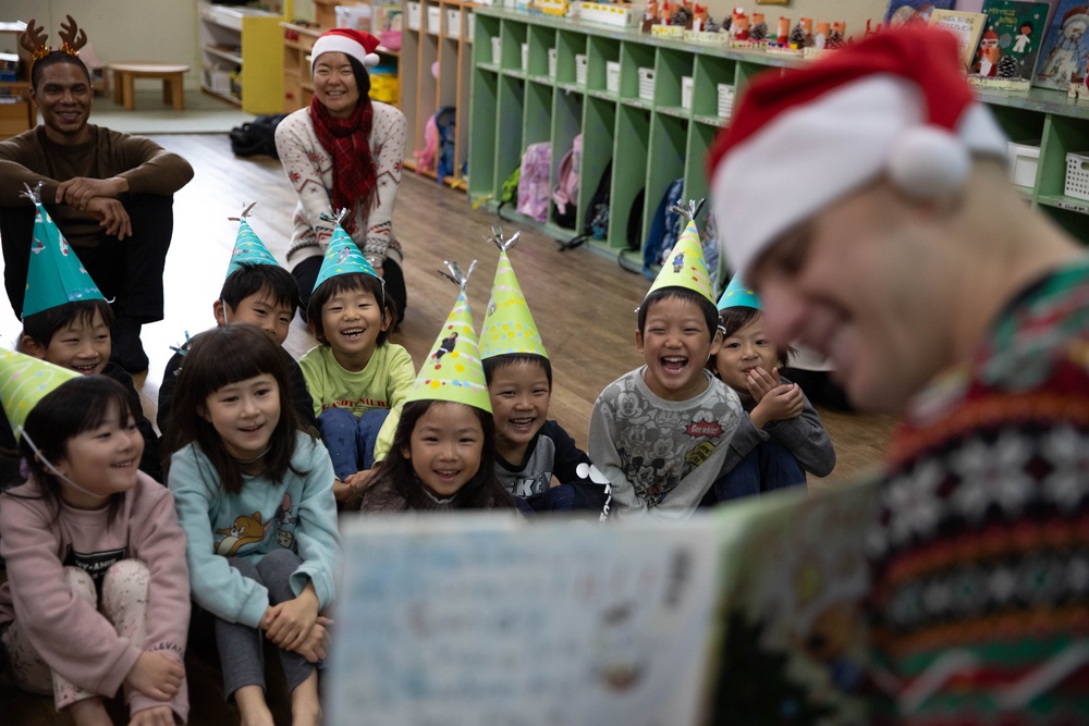 Holiday cheer: Volunteers from Marine Corps Air Station Iwakuni visit Higashi Nursery