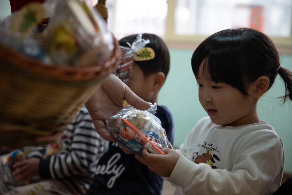 Holiday cheer: Volunteers from Marine Corps Air Station Iwakuni visit Higashi Nursery