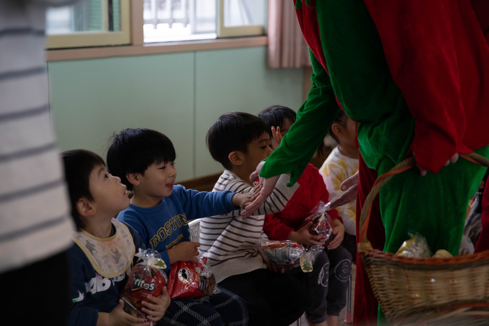Holiday cheer: Volunteers from Marine Corps Air Station Iwakuni visit Higashi Nursery