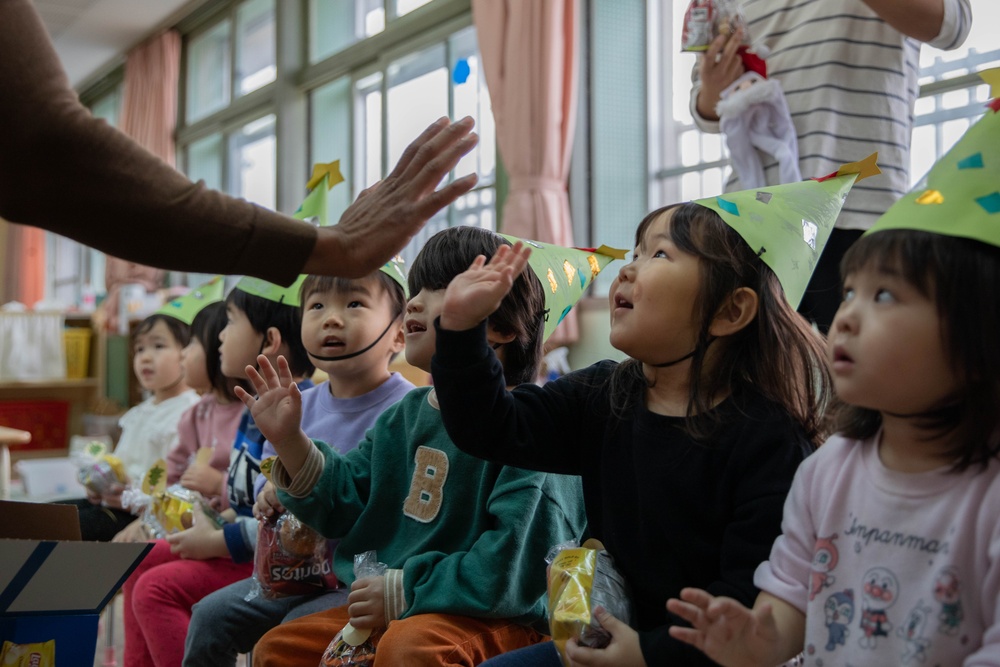 Holiday cheer: Volunteers from Marine Corps Air Station Iwakuni visit Higashi Nursery