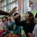 Holiday cheer: Volunteers from Marine Corps Air Station Iwakuni visit Higashi Nursery