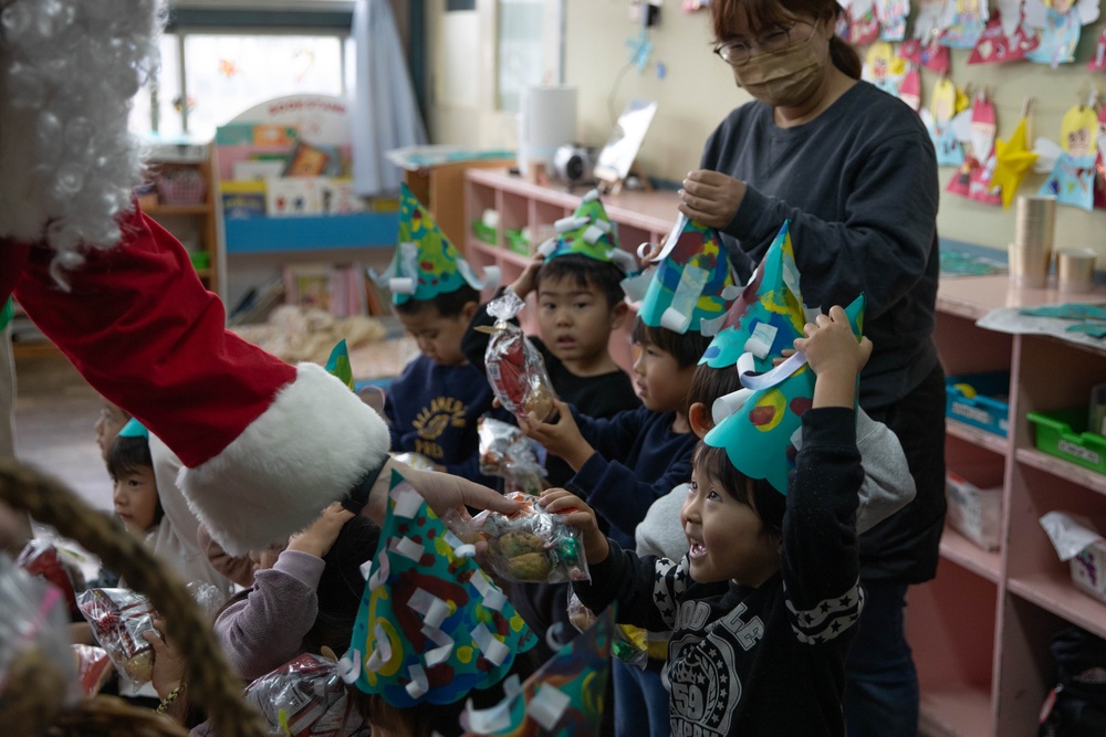 Holiday cheer: Volunteers from Marine Corps Air Station Iwakuni visit Higashi Nursery