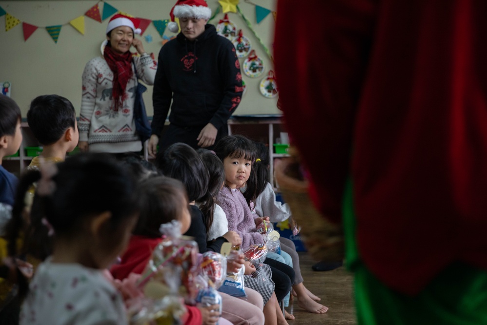 Holiday cheer: Volunteers from Marine Corps Air Station Iwakuni visit Higashi Nursery