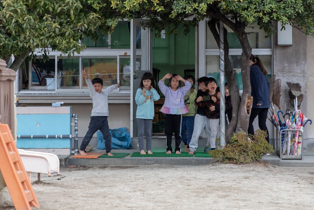 Holiday cheer: Volunteers from Marine Corps Air Station Iwakuni visit Higashi Nursery