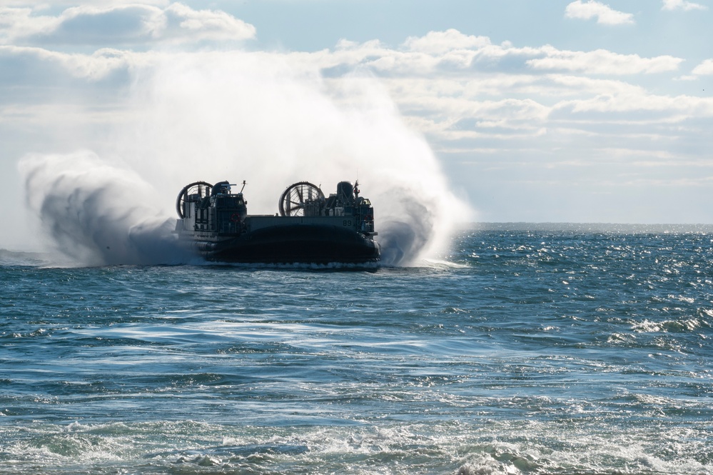 US Navy LCAC approaches USS New York (LPD-21)