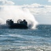 US Navy LCAC approaches USS New York (LPD-21)