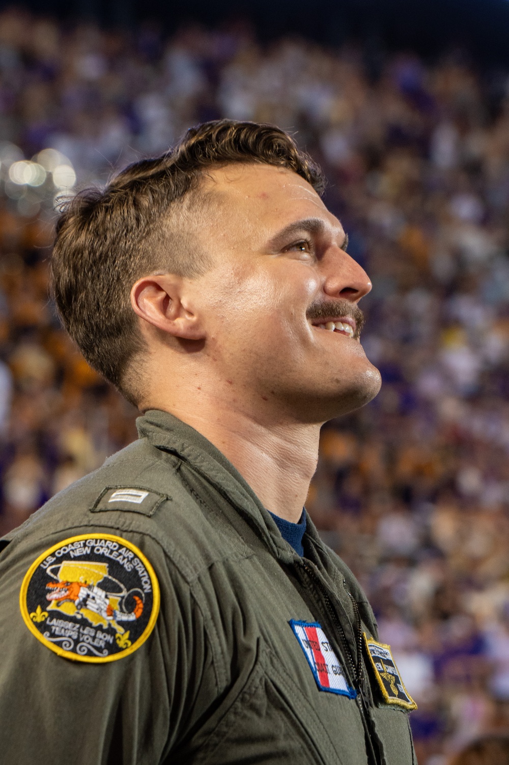 Coast Guard Aircrew conducts flyover at LSU Tiger Stadium