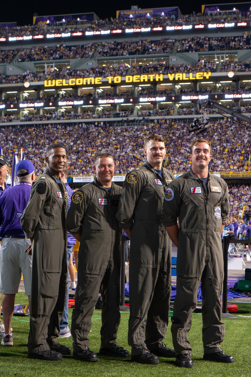 Coast Guard Aircrew conducts flyover at LSU Tiger Stadium