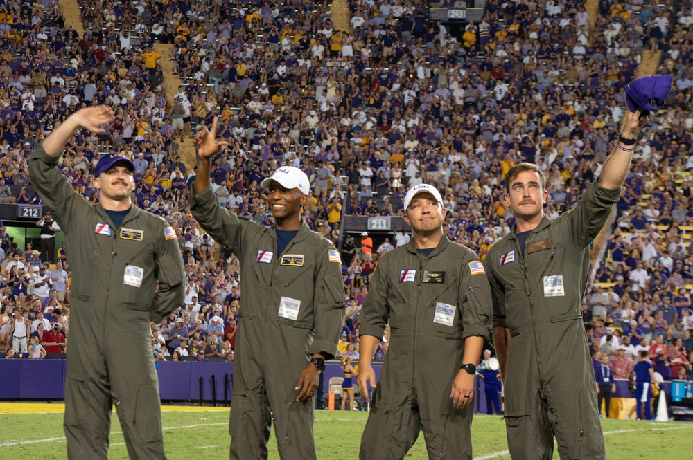 Coast Guard Aircrew conducts flyover at LSU Tiger Stadium