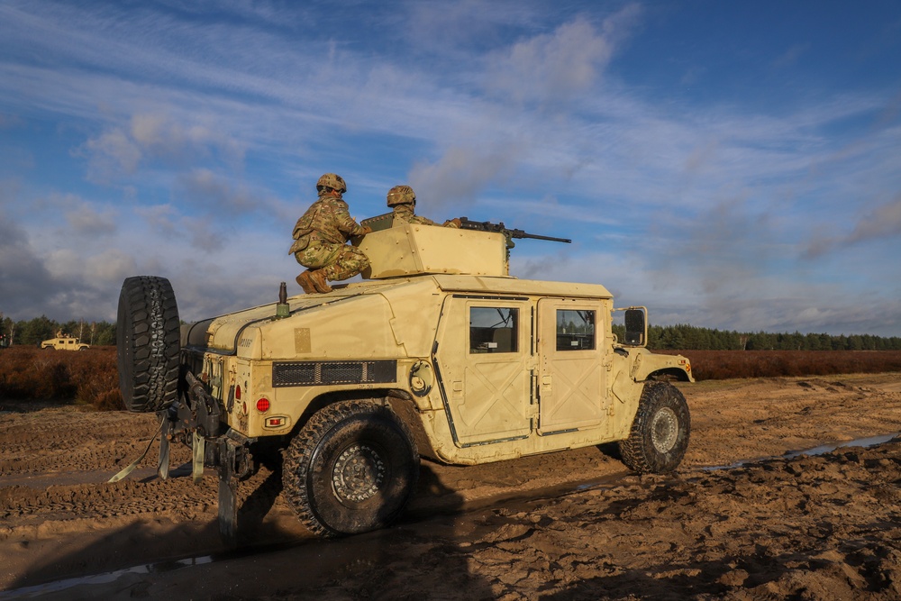 Sustainment Soldiers organize crew-served range