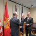 Assistant Secretary of the Navy for Research, Development, and Acquisition Nickolas H. Guertin takes an oath as he is sworn in by the Under Secretary of the Navy Erik Raven