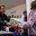 Paratroopers from Task Force 82 present gifts to children during Operation Angel Tree