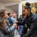 Paratroopers from Task Force 82 present gifts to children during Operation Angel Tree
