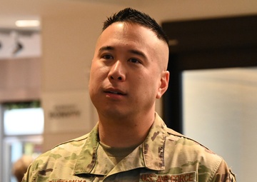 Members from the 272nd Engineering Installation Squadron receive token of appreciation
