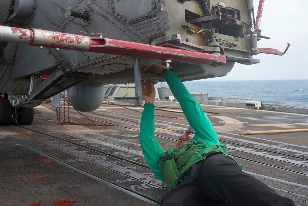 Sailors Move MH-60R into Hangar Bay