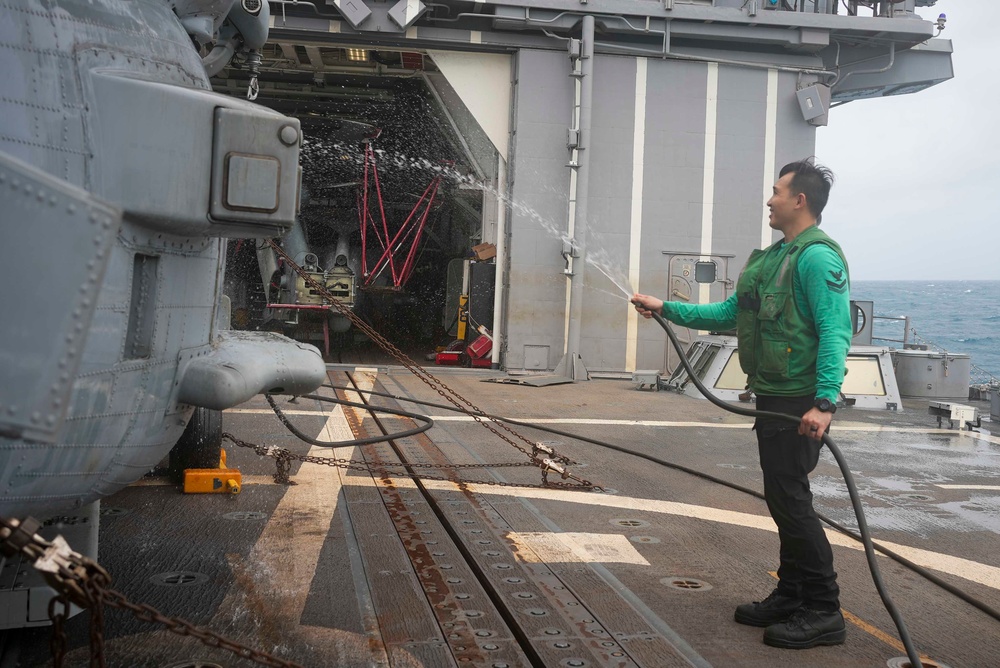 Sailors Move MH-60R into Hangar Bay