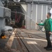 Sailors Move MH-60R into Hangar Bay