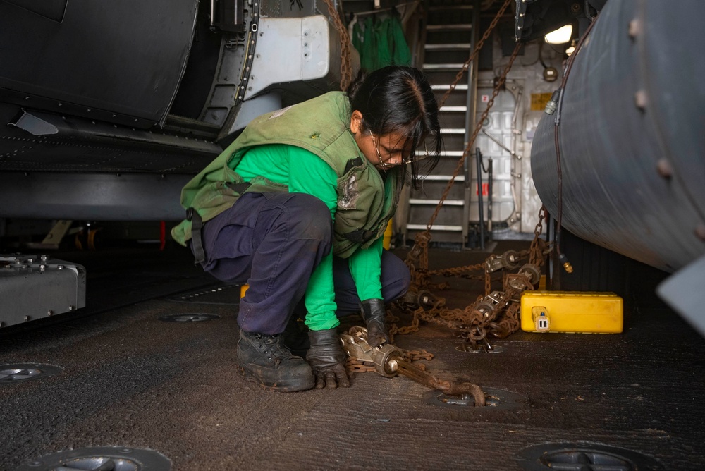 Sailors Move MH-60R into Hangar Bay