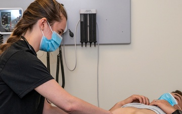 Military Medical Students Practice Physical Exams
