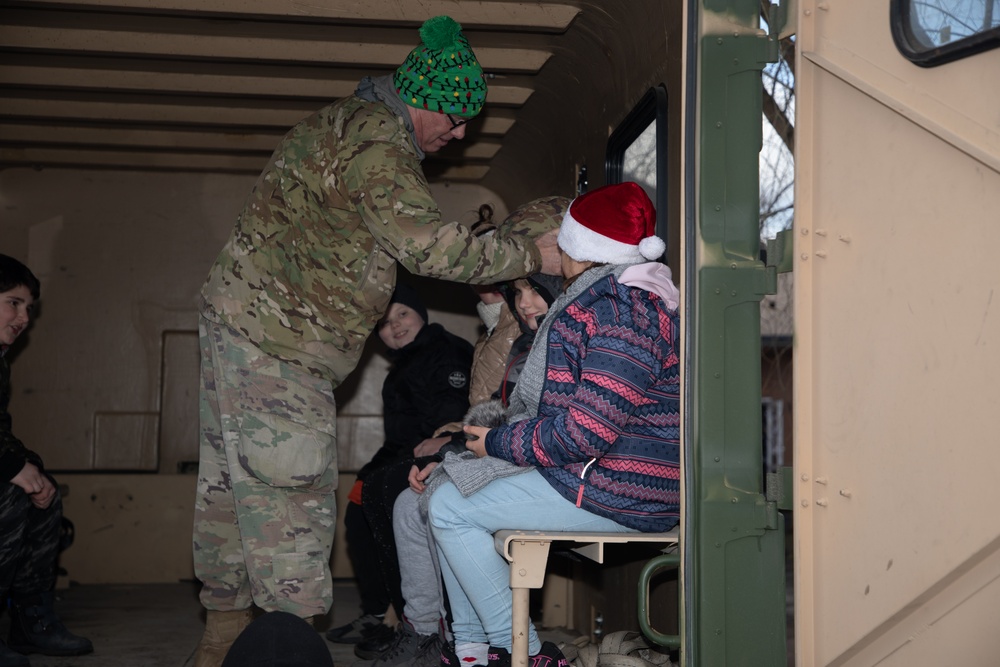 Kentucky’s National Guard 2113th Transportation Company visits non public primary school in Poland