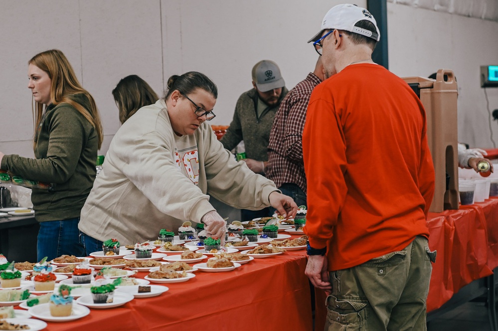 139th members volunteer at a Christmas party for Specialty Industries