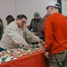 139th members volunteer at a Christmas party for Specialty Industries