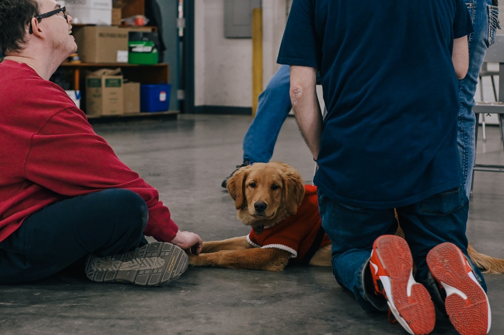 139th members volunteer at a Christmas party for Specialty Industries