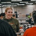 139th members volunteer at a Christmas party for Specialty Industries