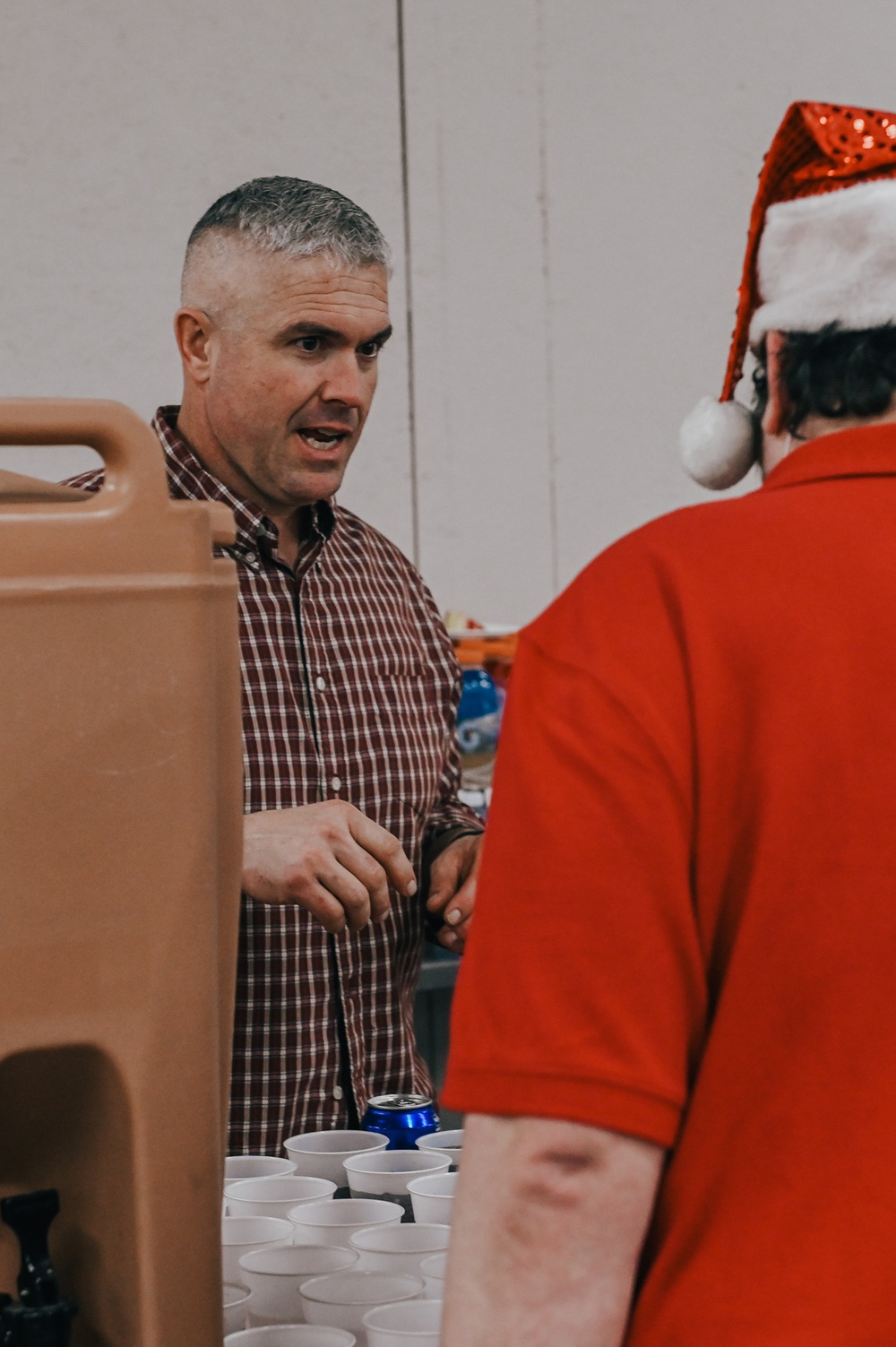 139th members volunteer at a Christmas party for Specialty Industries