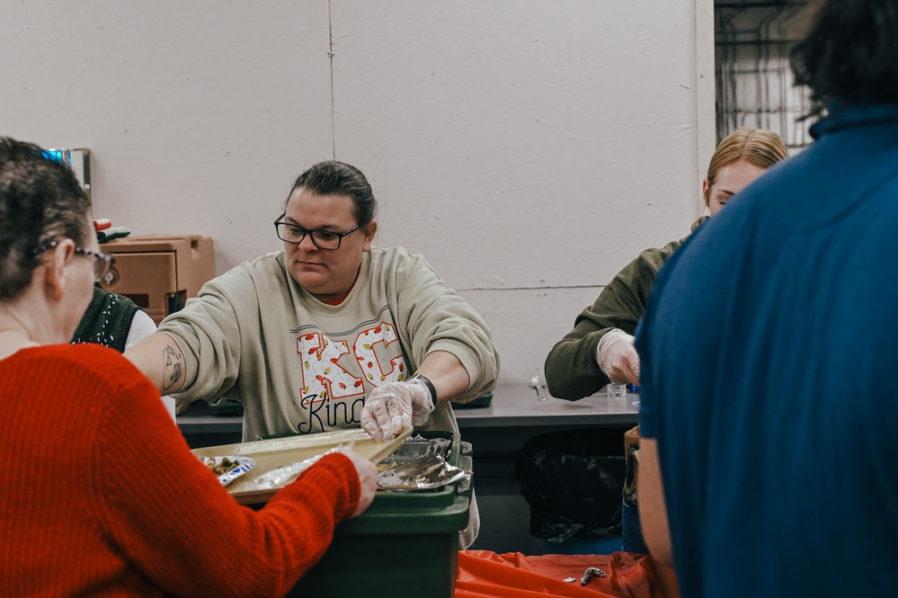 139th members volunteer at a Christmas party for Specialty Industries