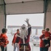 139th members volunteer at a Christmas party for Specialty Industries