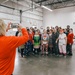 139th members volunteer at a Christmas party for Specialty Industries
