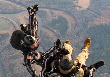 Dobbins Airmen help Army paratroopers jump into holidays