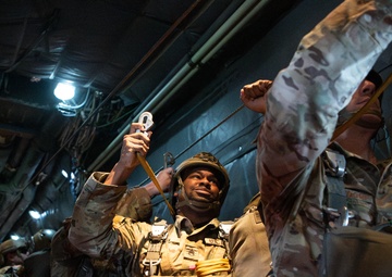 Dobbins Airmen help Army paratroopers jump into holidays