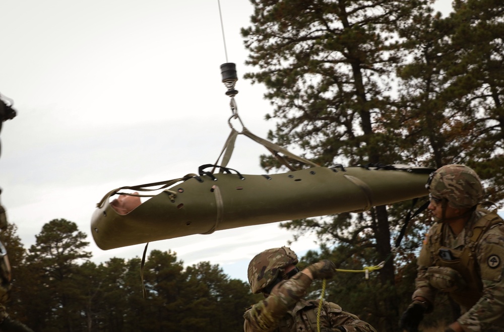 Black Hawk helicopter crew chiefs 1st-171st General Support Aviation Battalion, 57th Troop Command conduct medical evacuation drills for predeployment training