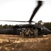 Black Hawk helicopter crew chiefs 1st-171st General Support Aviation Battalion, 57th Troop Command conduct medical evacuation drills for predeployment training