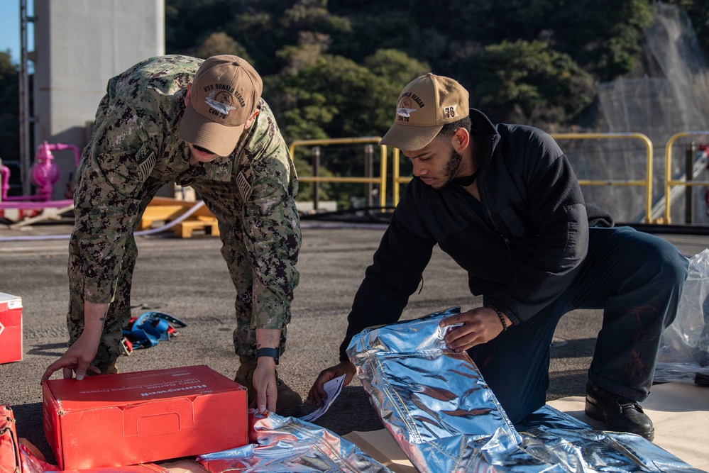 USS Ronald Reagan (CVN 76) Sailors prepare for inspection