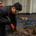 USS Ronald Reagan (CVN 76) Sailors perform maintenance and corrosion control