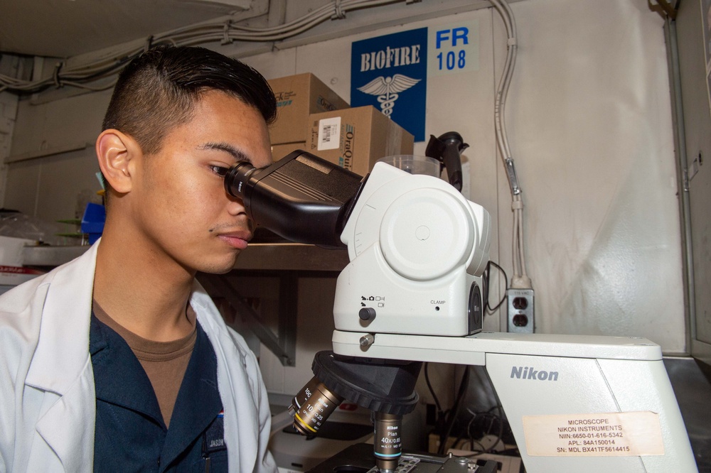 USS Ronald Reagan (CVN 76) Sailors perform maintenance and corrosion control