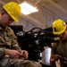 National Guard Helicopter Crew Chiefs conduct Maintenance on Black Hawk Helicopters