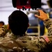 National Guard Helicopter Crew Chiefs conduct Maintenance on Black Hawk Helicopters